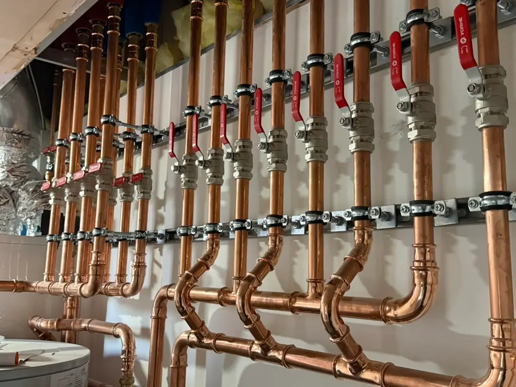 a custom copper pipe manifold system