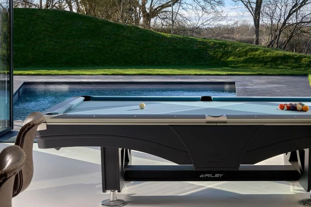 Griffon House — pool room opening to games room