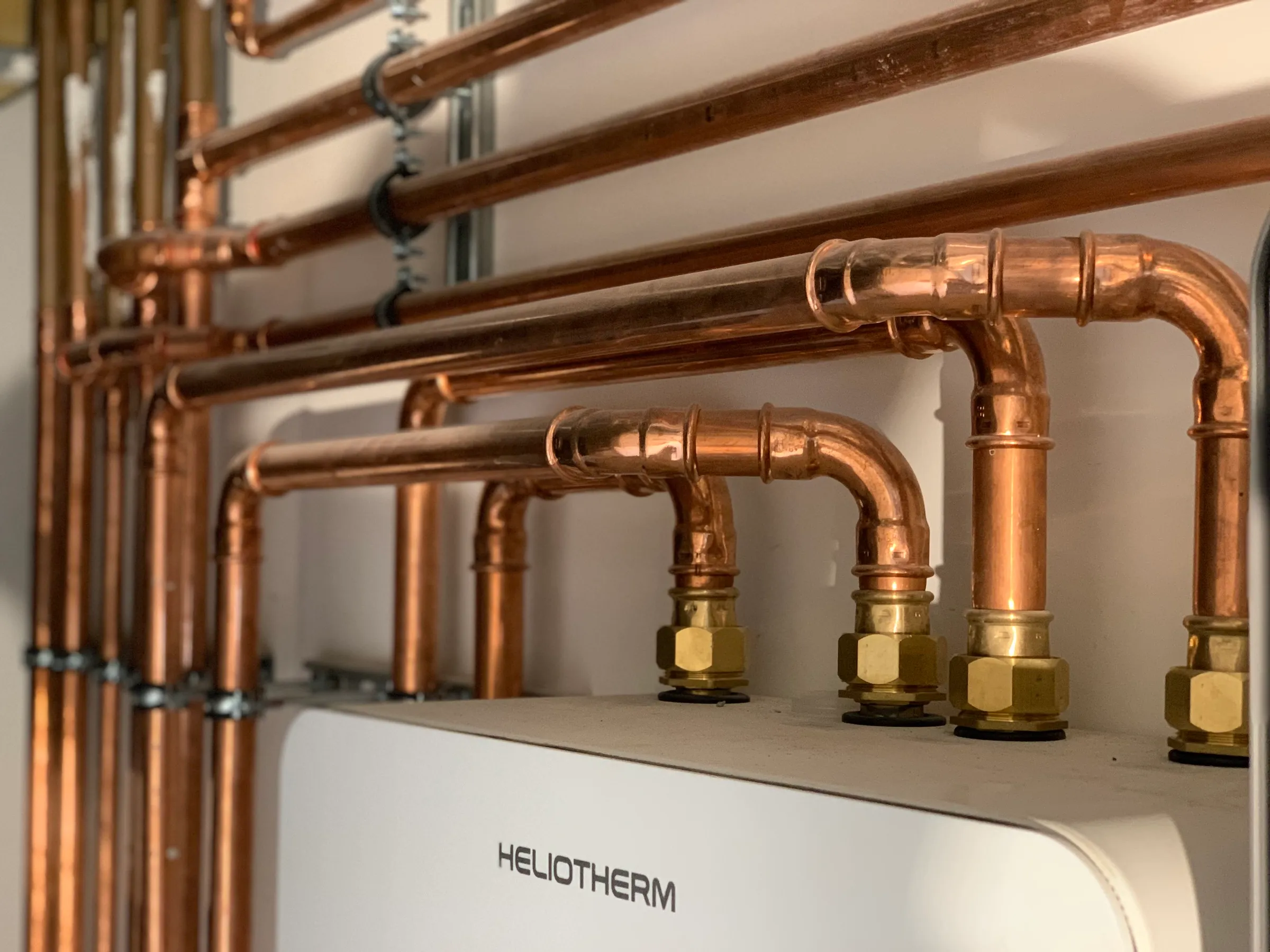 Griffon House — copper pipework in mechanical room