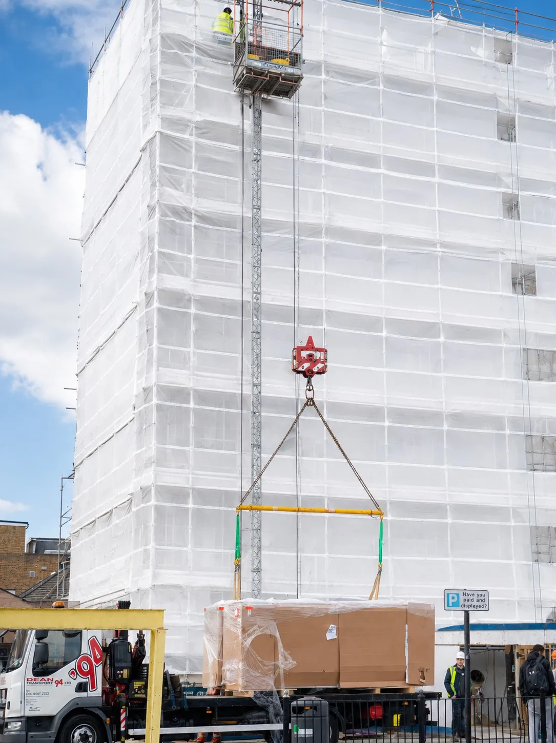Southall project — crated unit craned up building facade