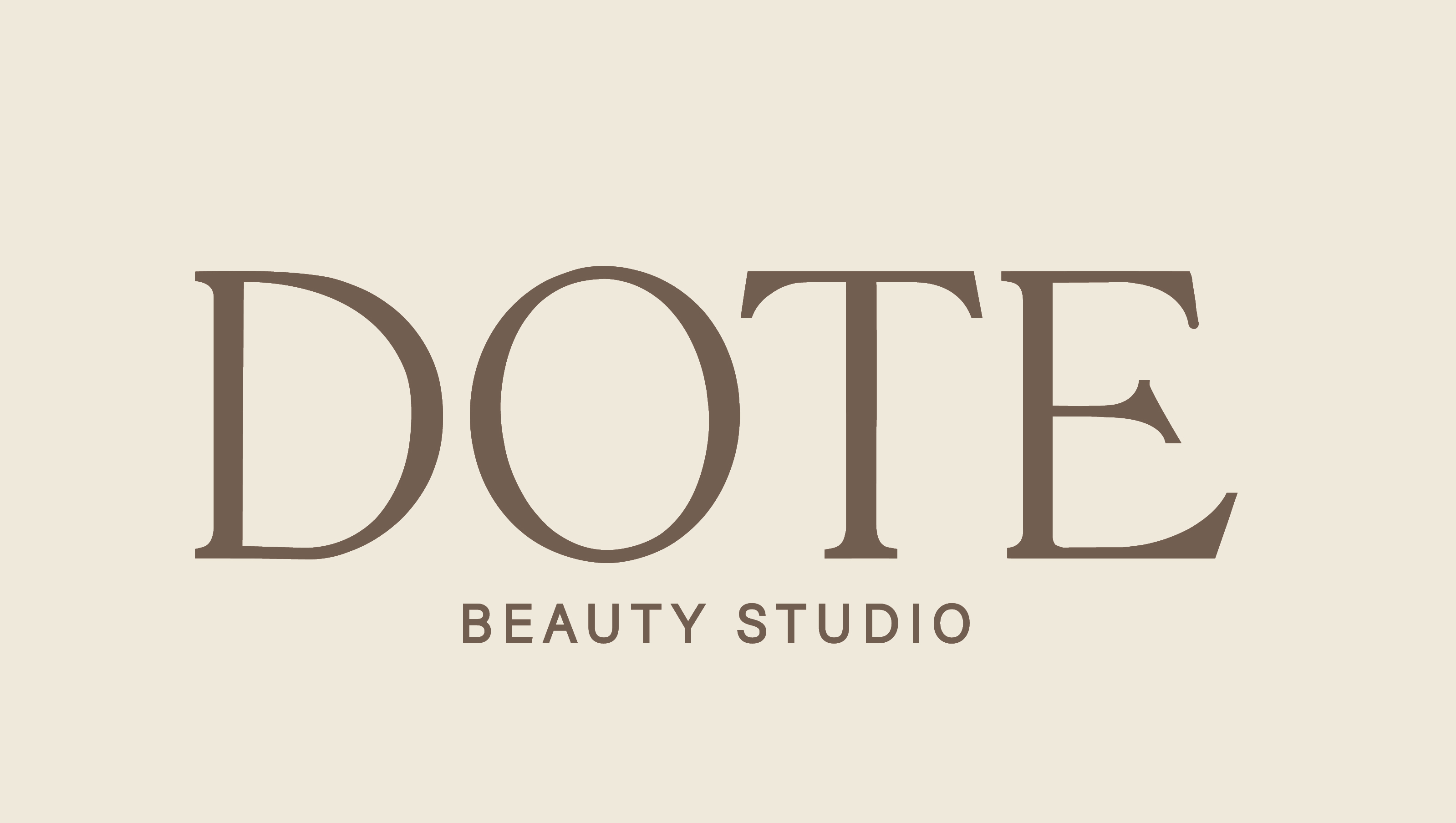 Logo with the text DOTE in large letters and Beauty Studio below in smaller letters on a beige background.