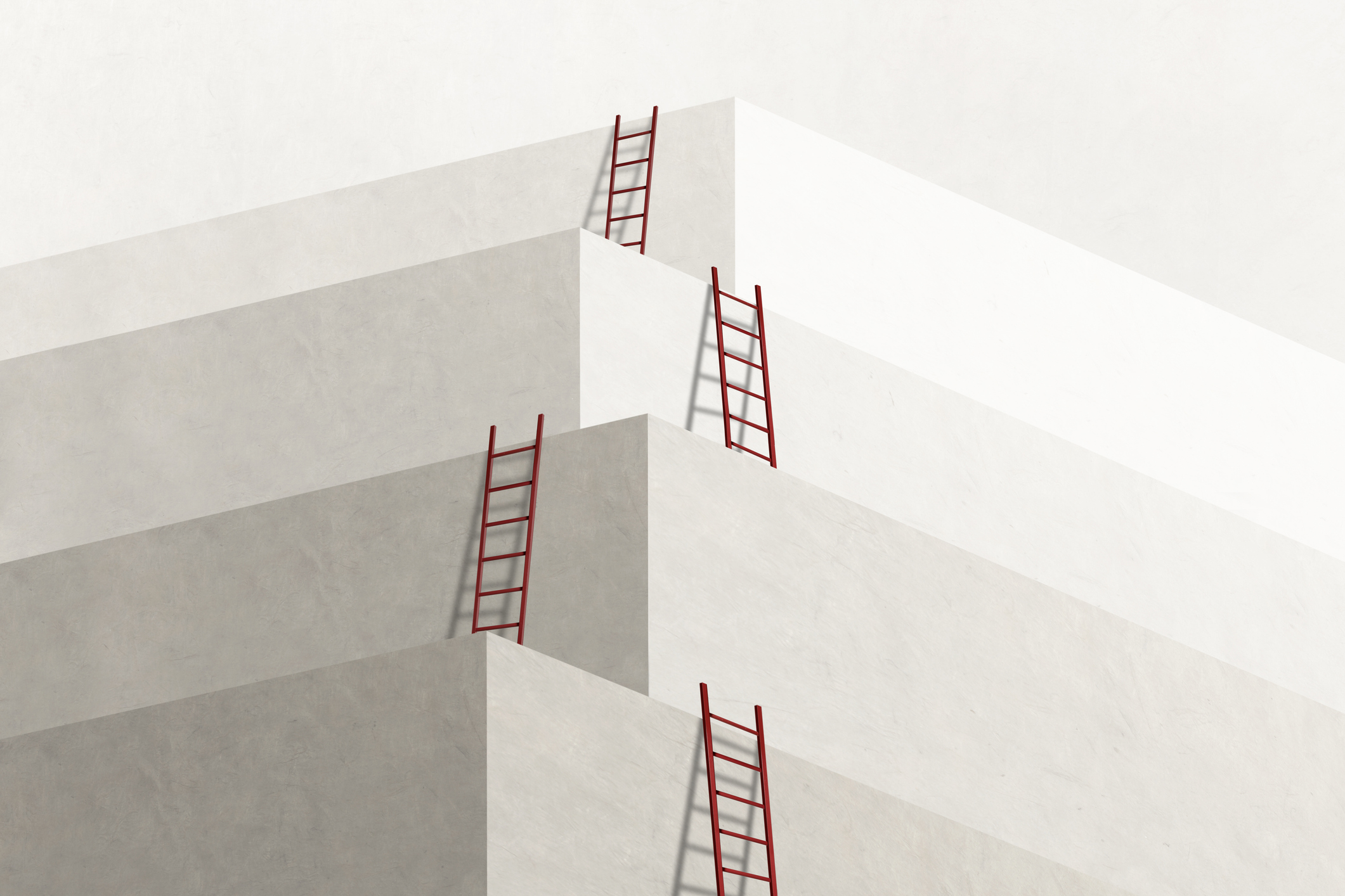 Red ladders leaning against a stepped concrete structure.