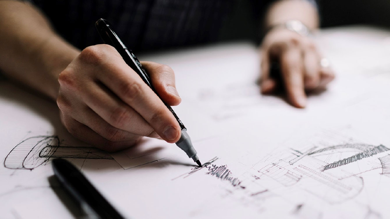 Architect sketching a building plan
