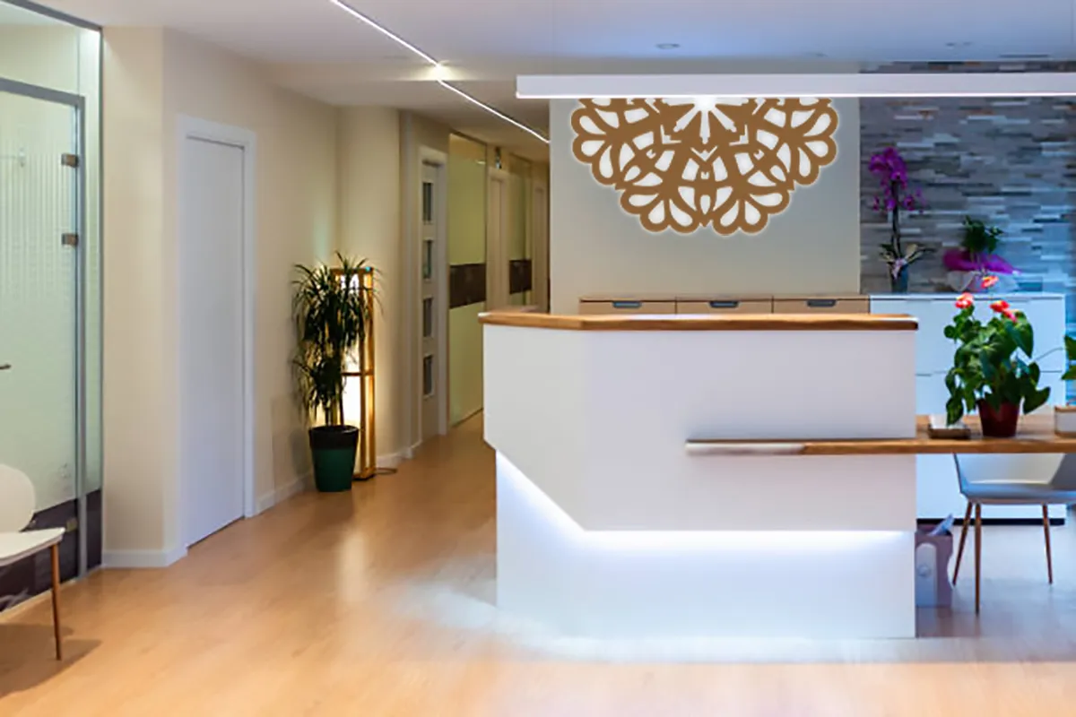 Wellness center lobby featuring a decorative Flowstate wall installation.