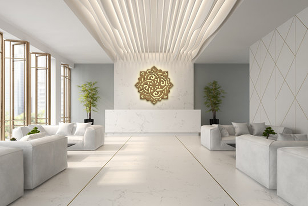 Minimal wellness reception featuring Dreamcatcher as an illuminated architectural wall installation.