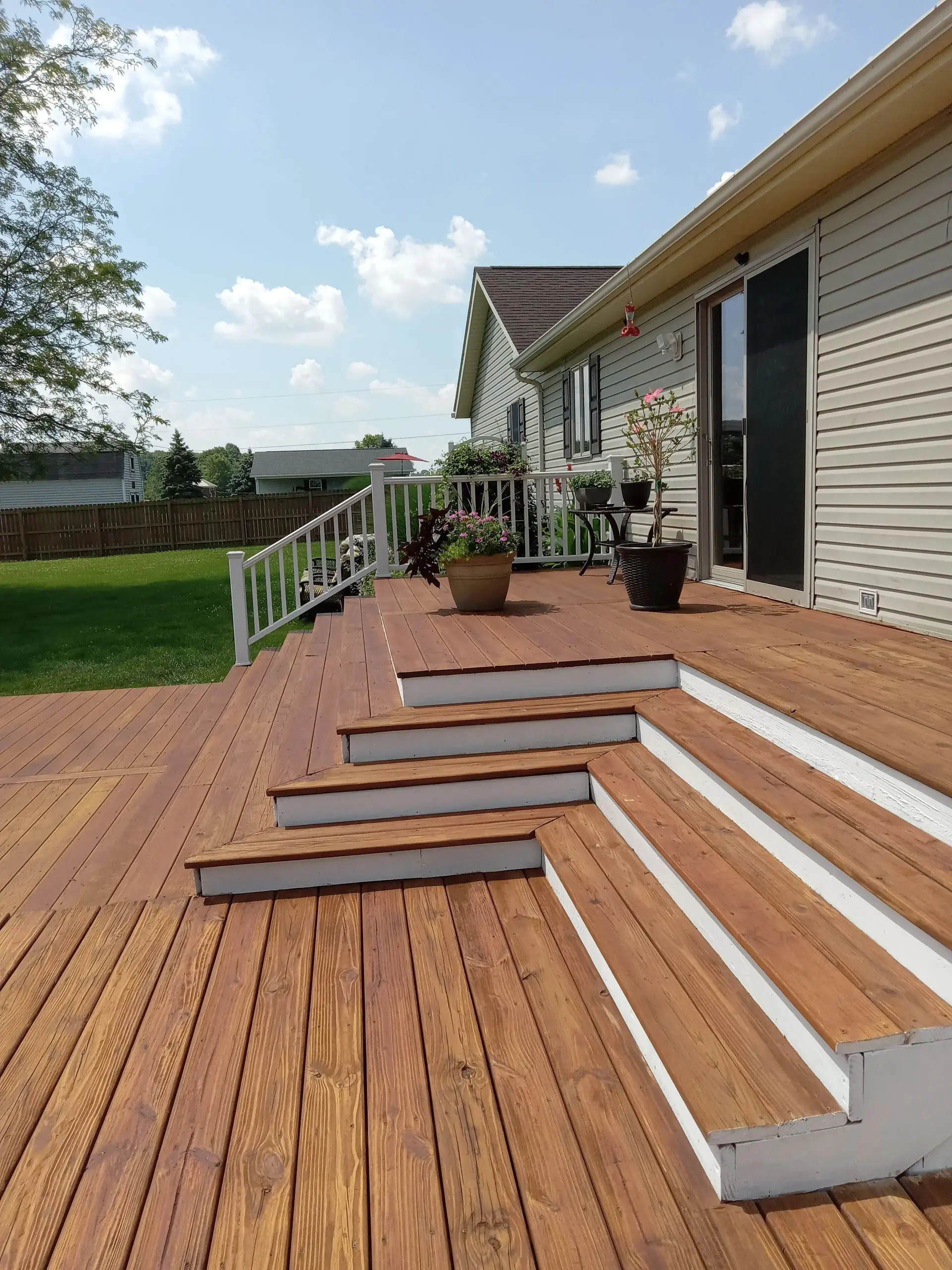 multi level deck with steps wood stained