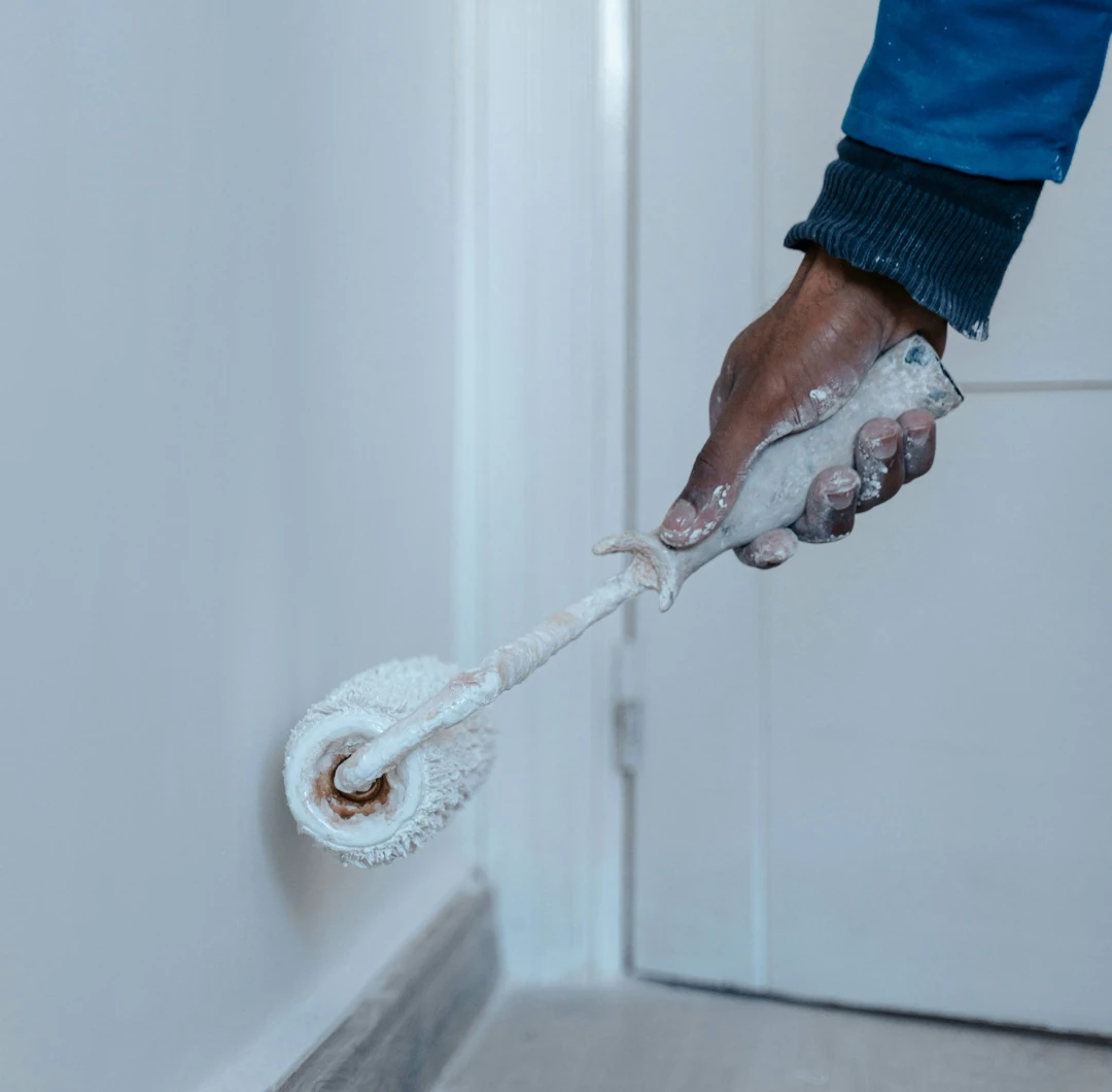 hand paint rolling up wall