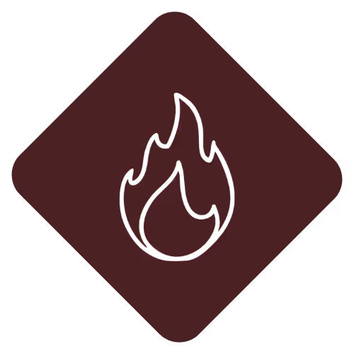 Brown asterisk symbol with rounded ends on a white background.