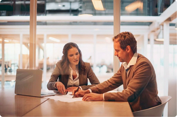 Two people meeting to discuss results