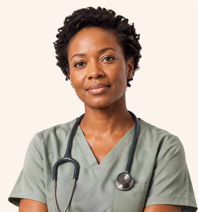 Confident female healthcare professional wearing green scrubs with a stethoscope around her neck.