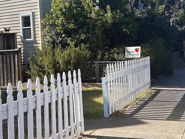 Campaign sign on fence