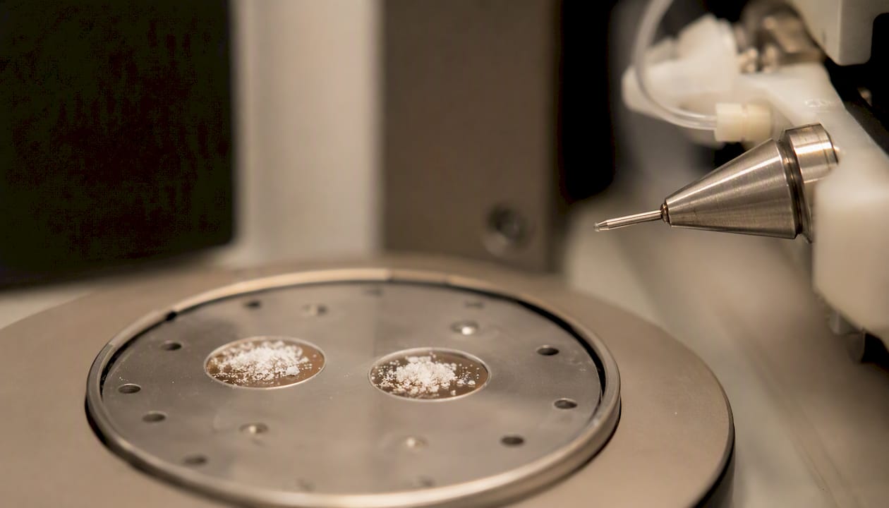 Close-up of MALDI plate spot and ESI spray tip