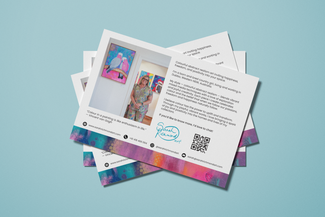 Stack of flyers on a blue surface with a photo of a female artist standing in an art gallery with colorful paintings, including a painting of two birds. The flyer includes an artist statement about colorful abstract realism, positive energy, and an invitation to chat, along with contact details, social media handles, a QR code, and a Vincent van Gogh quote: 'Colour in a painting is like enthusiasm in life.'