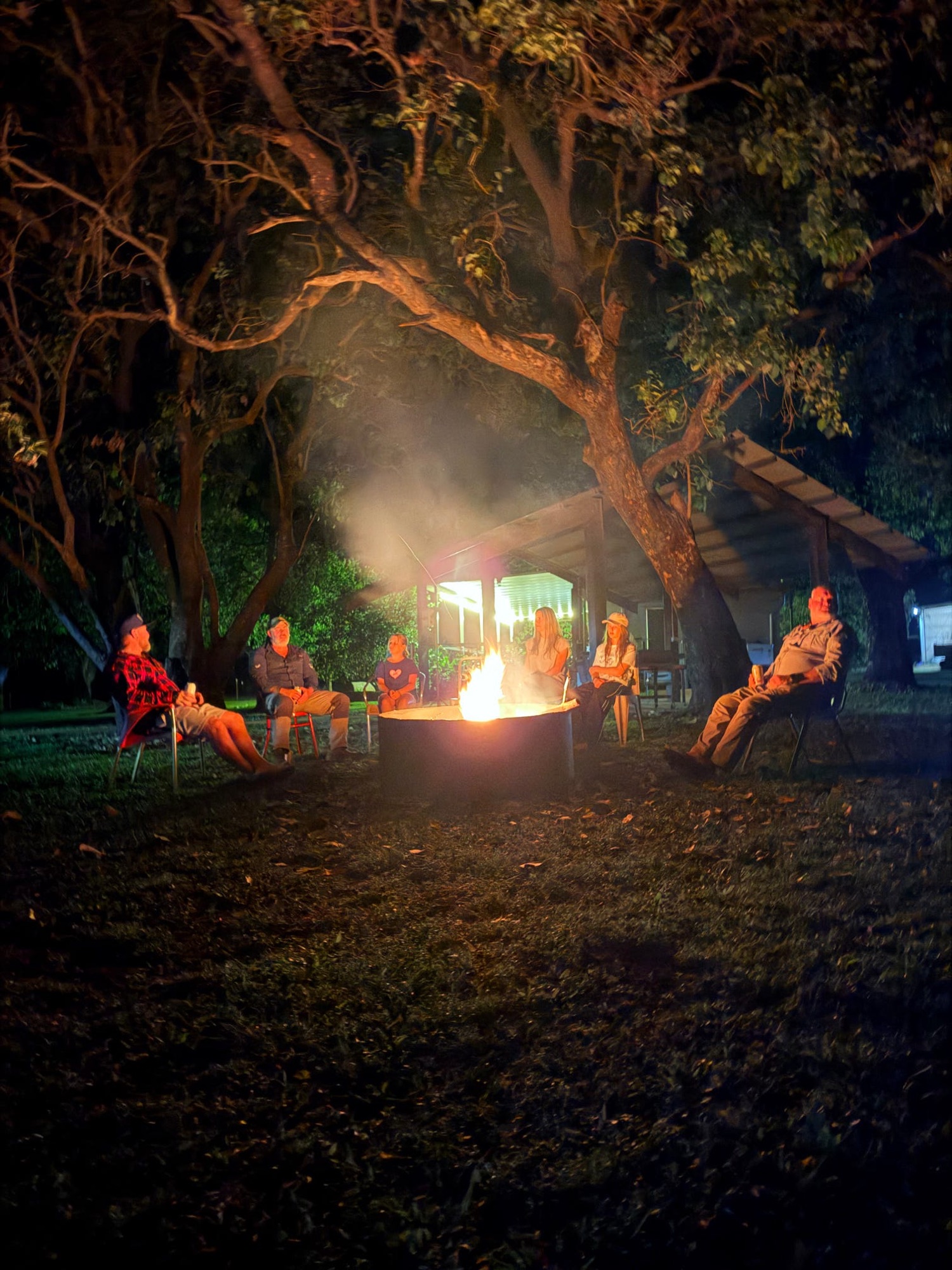 Fire going in camp after dark