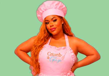 Crumb & Glaze baker, hand on hip, against a green background