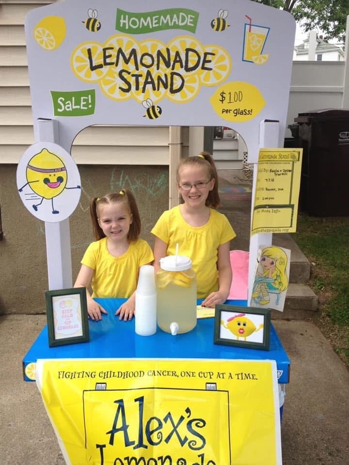 The sisters as small children at their first homemade lemonade stand