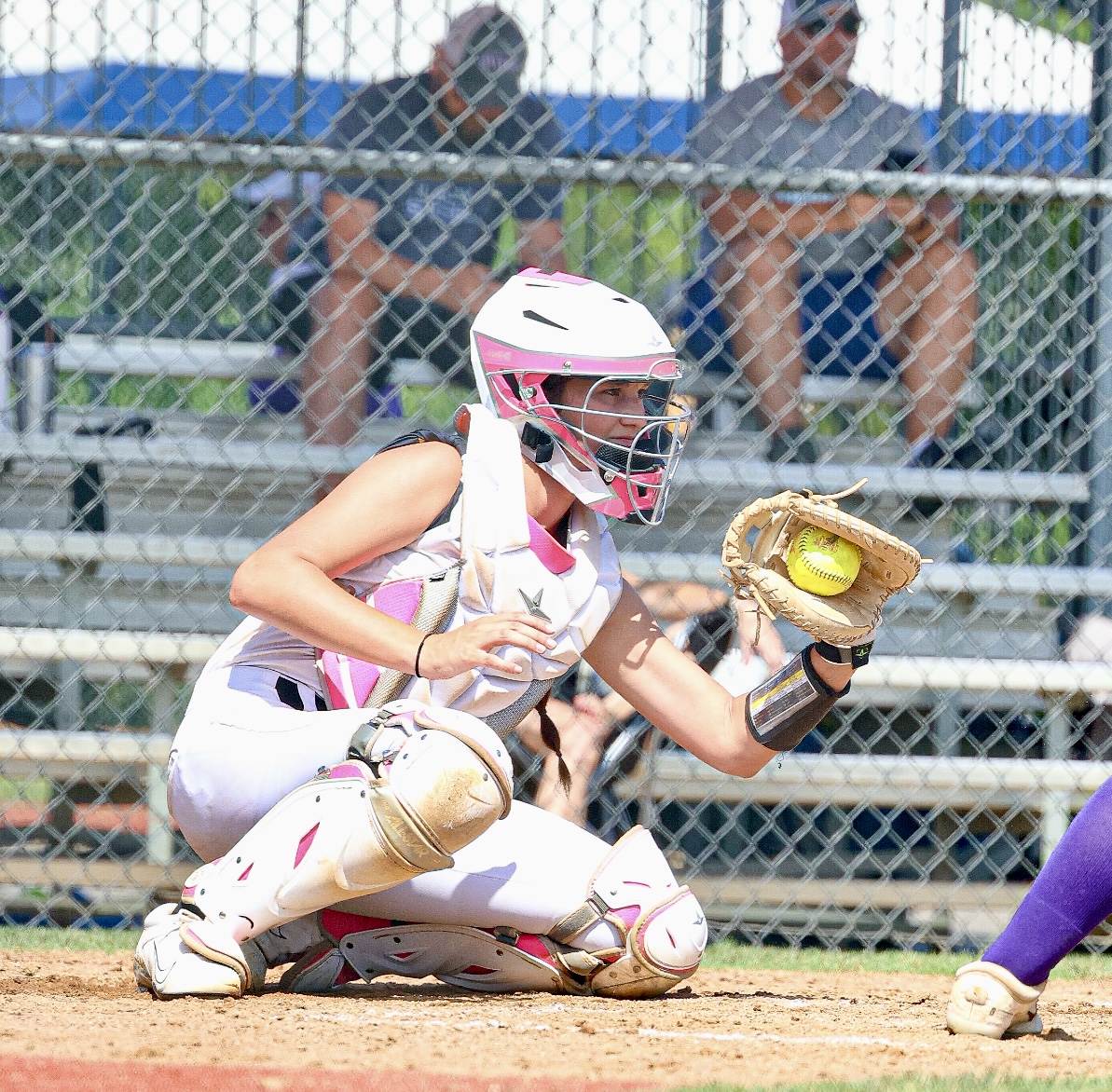 Payton Cascio behind the plate in catcher's gear