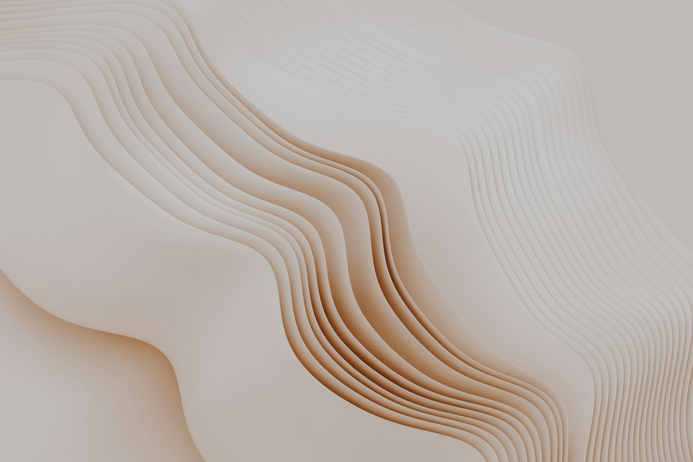 Layered waves of warm sand-coloured material