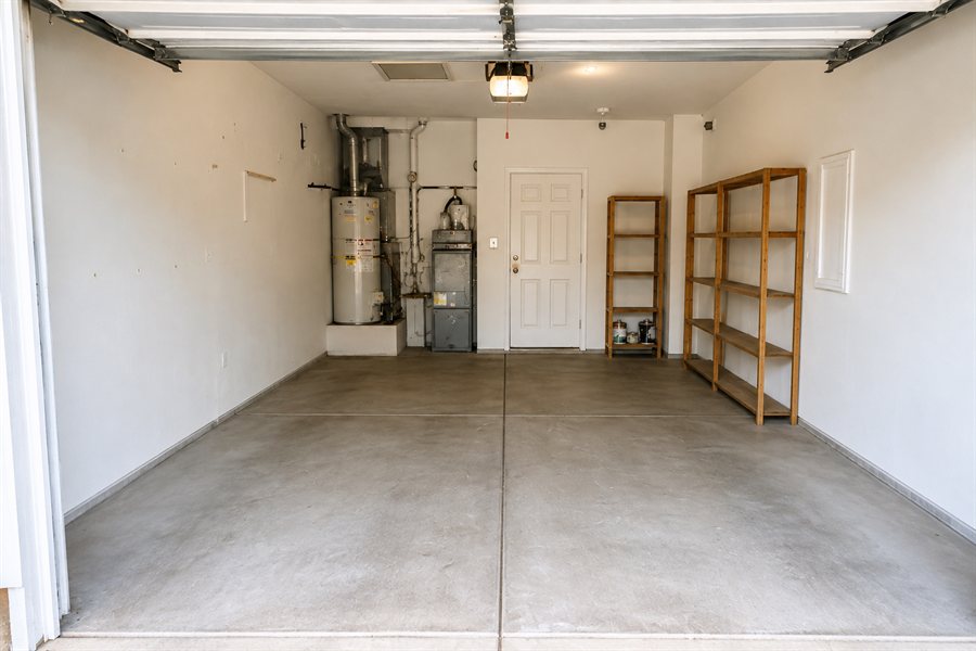 The same garage completely cleared and swept after junk removal