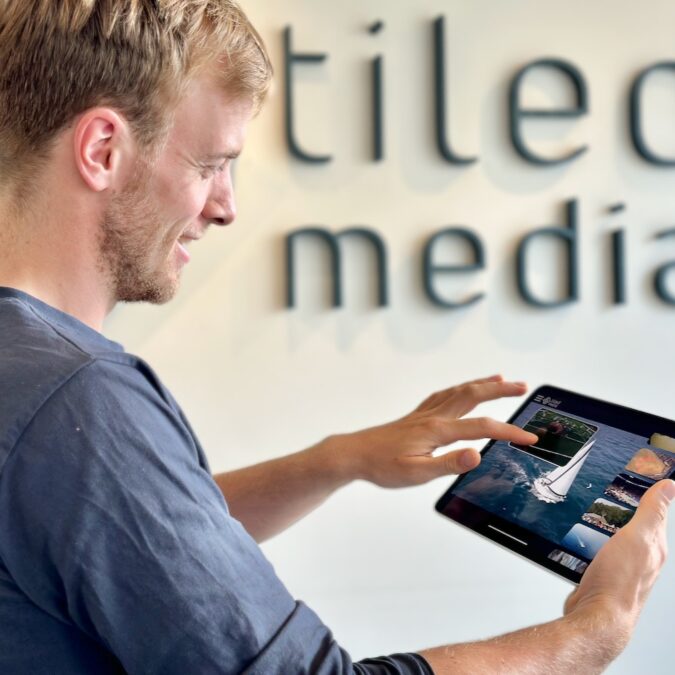 Marius holding ipad with Multiview