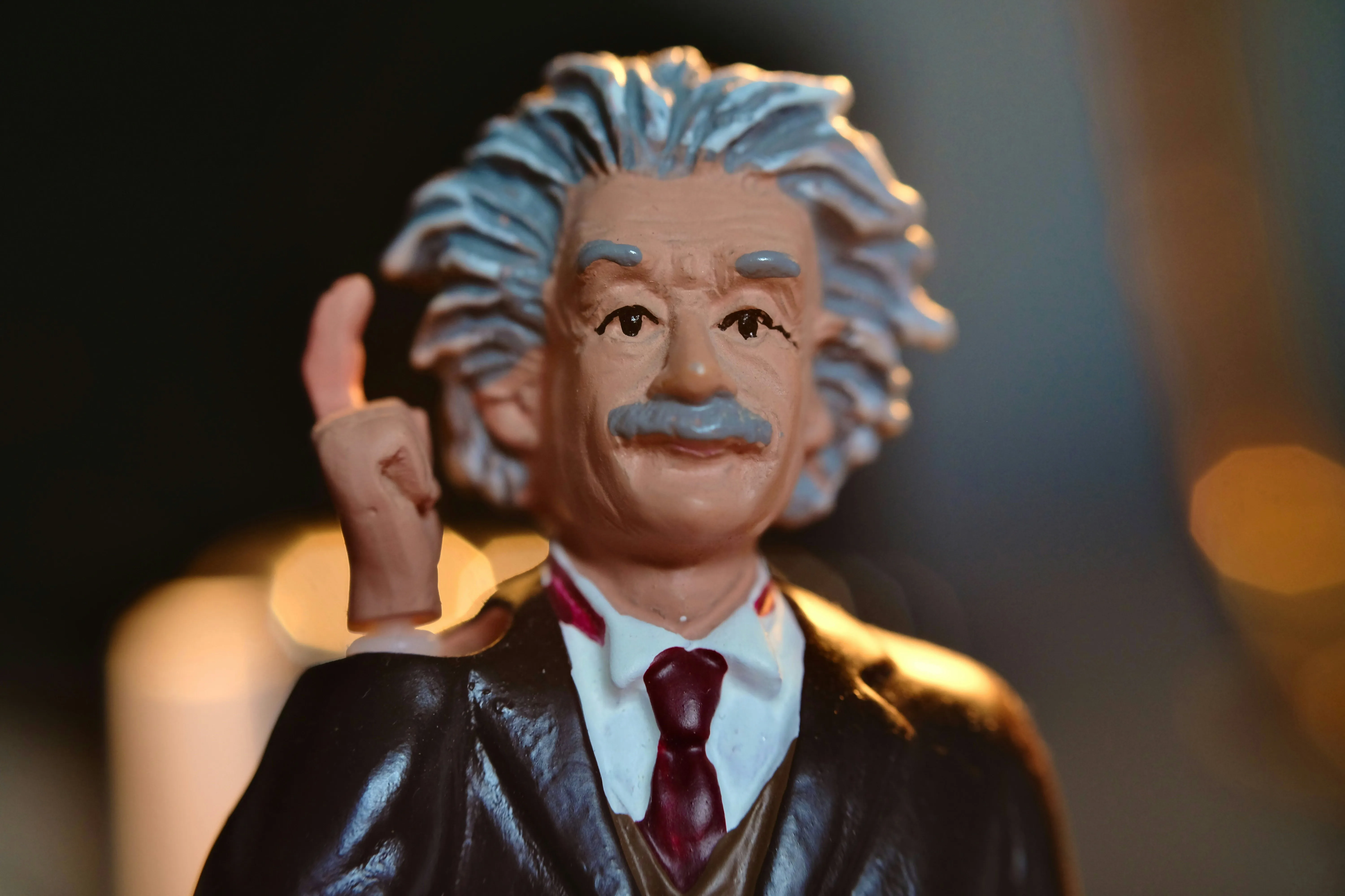 Einstein figurine on a desk