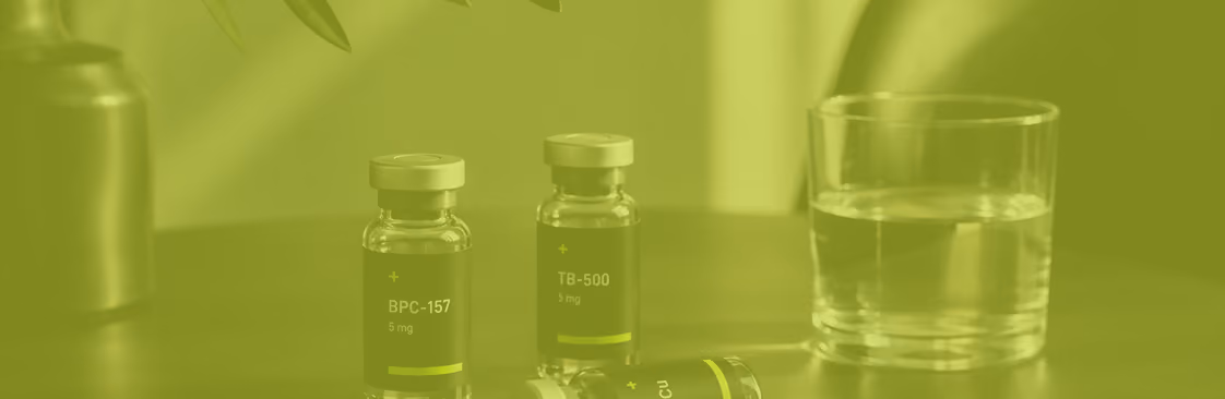 Peptide vials labeled BPC-157 and TB-500 on a table