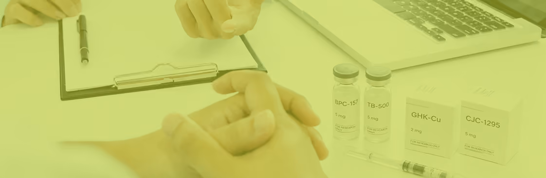 Peptide therapy vials and clinician notes on a desk