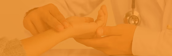 Doctor checking a patient's pulse
