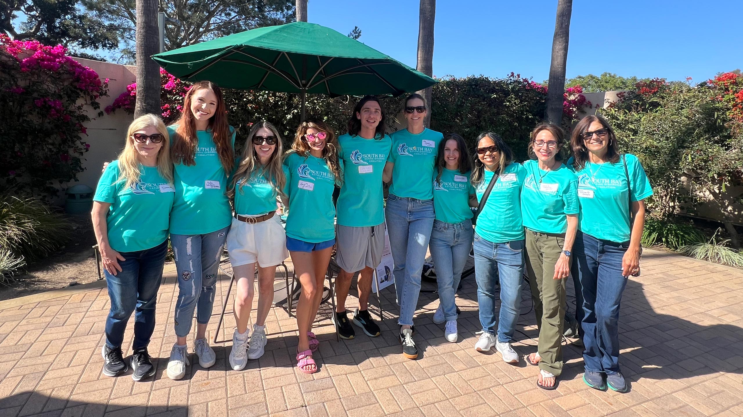 Group photo of SBEDC members at a community event