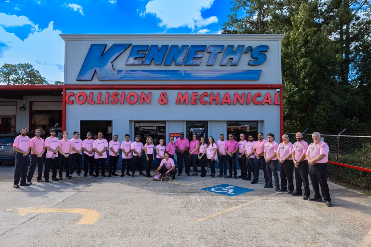Kenneth's Car Care team in front of the Kingwood, TX collision & mechanical shop