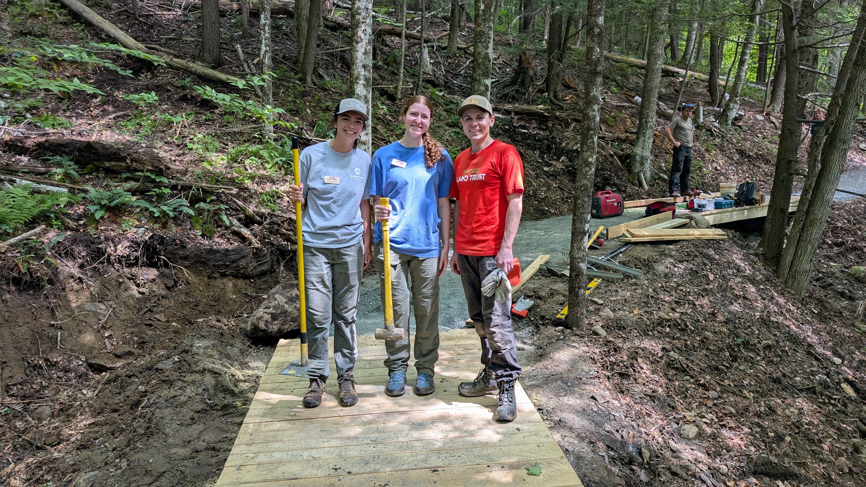 Volunteers building an ADA-compliant bridge in Stowe, Vermont