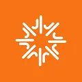 White stylized star or snowflake emblem on an orange background.