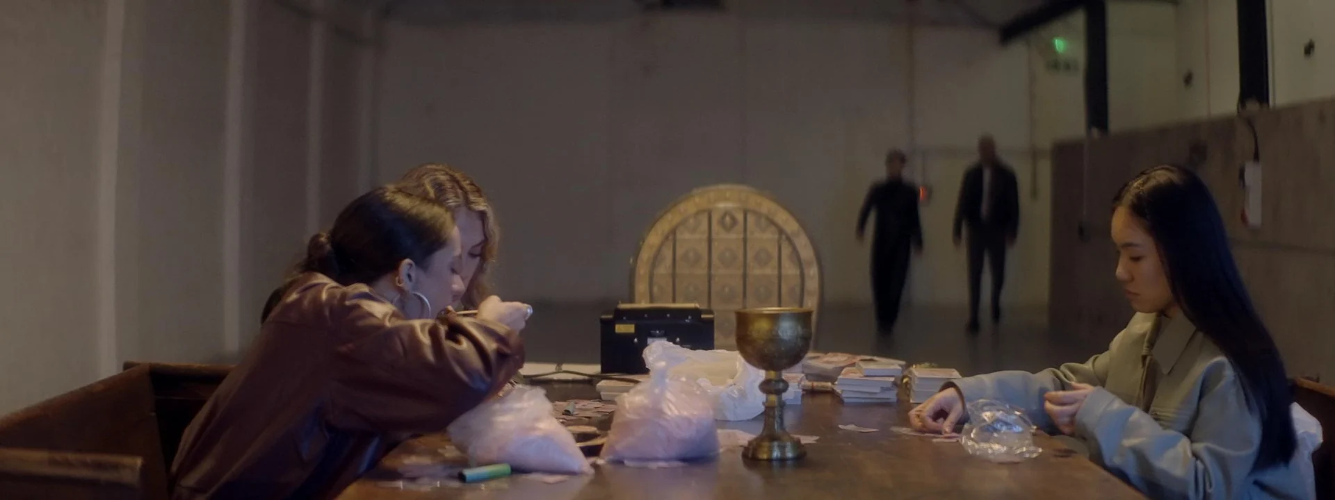 Lady Fins — A meeting around a long table