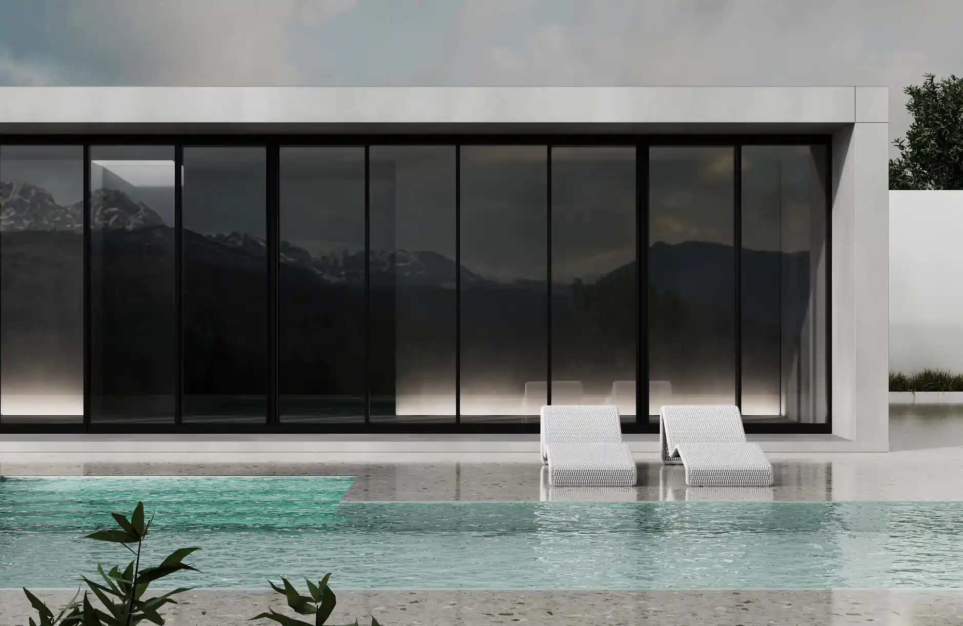 Grandes baies vitrées d'une villa avec film solaire