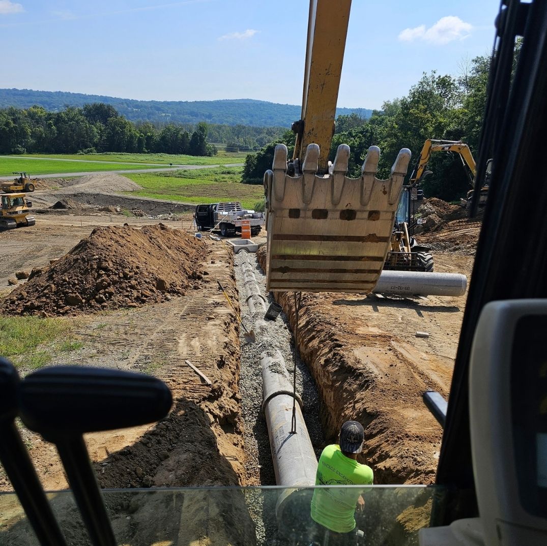  Wantage Excavating crew installing underground drainage and utility systems as part of a commercial site development project in Northern New Jersey.