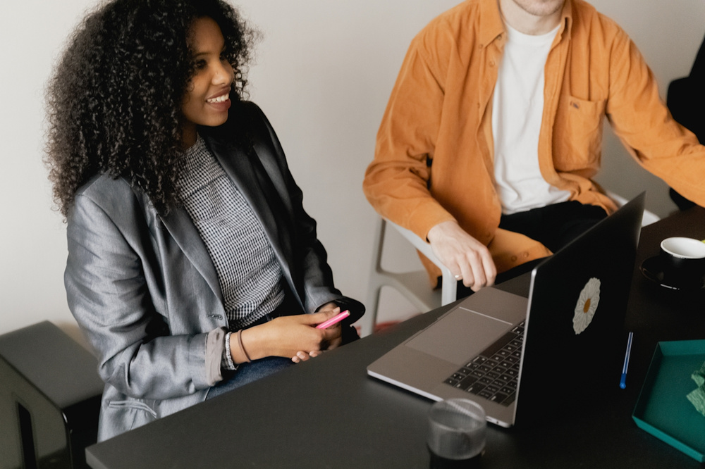 Business owner working at a desk with accounting software open