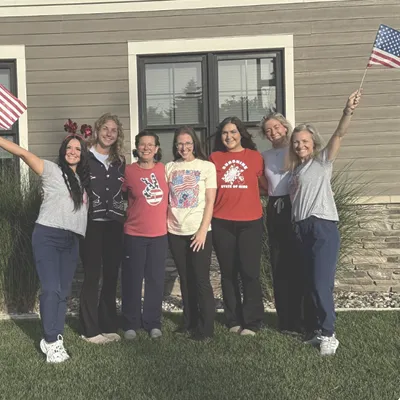 Gillis Family Chiropractic team photo outside the office
