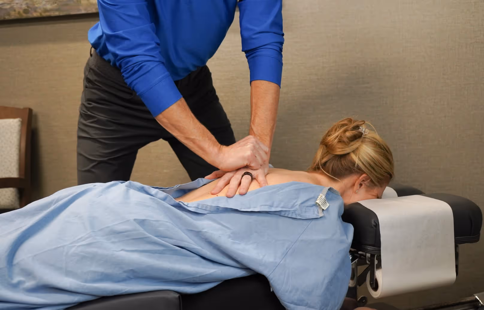 Dr Ben giving an adjustment to a patient