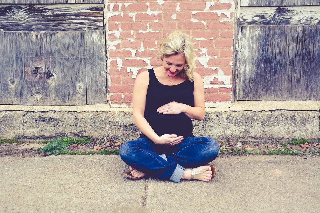Happy and comfortable patient after pregnancy chiropractic care