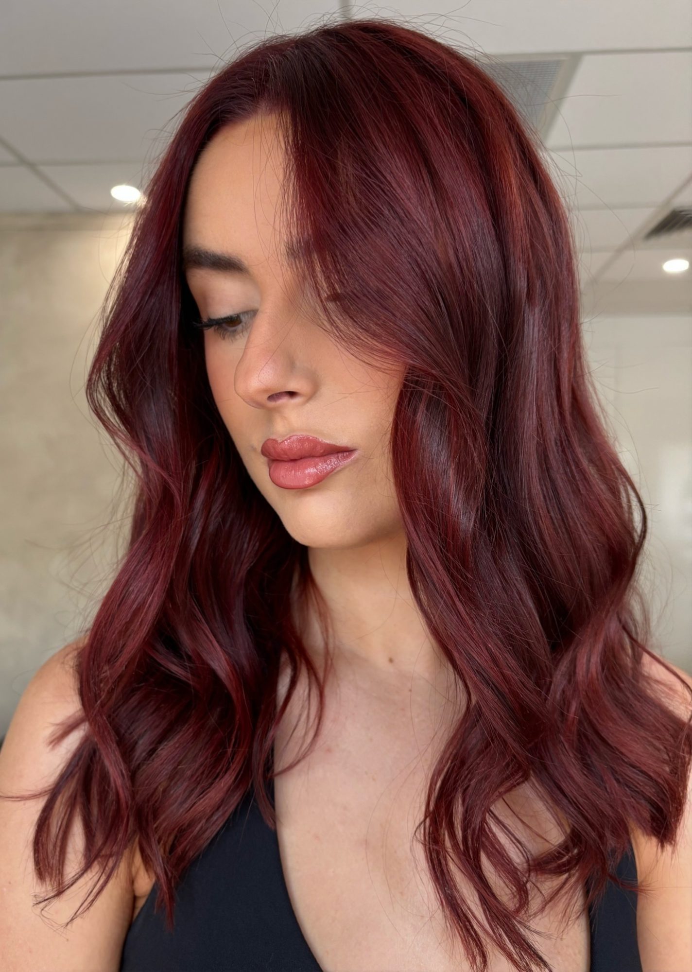 Deep red copper waves finished at Purabelle in Nerang