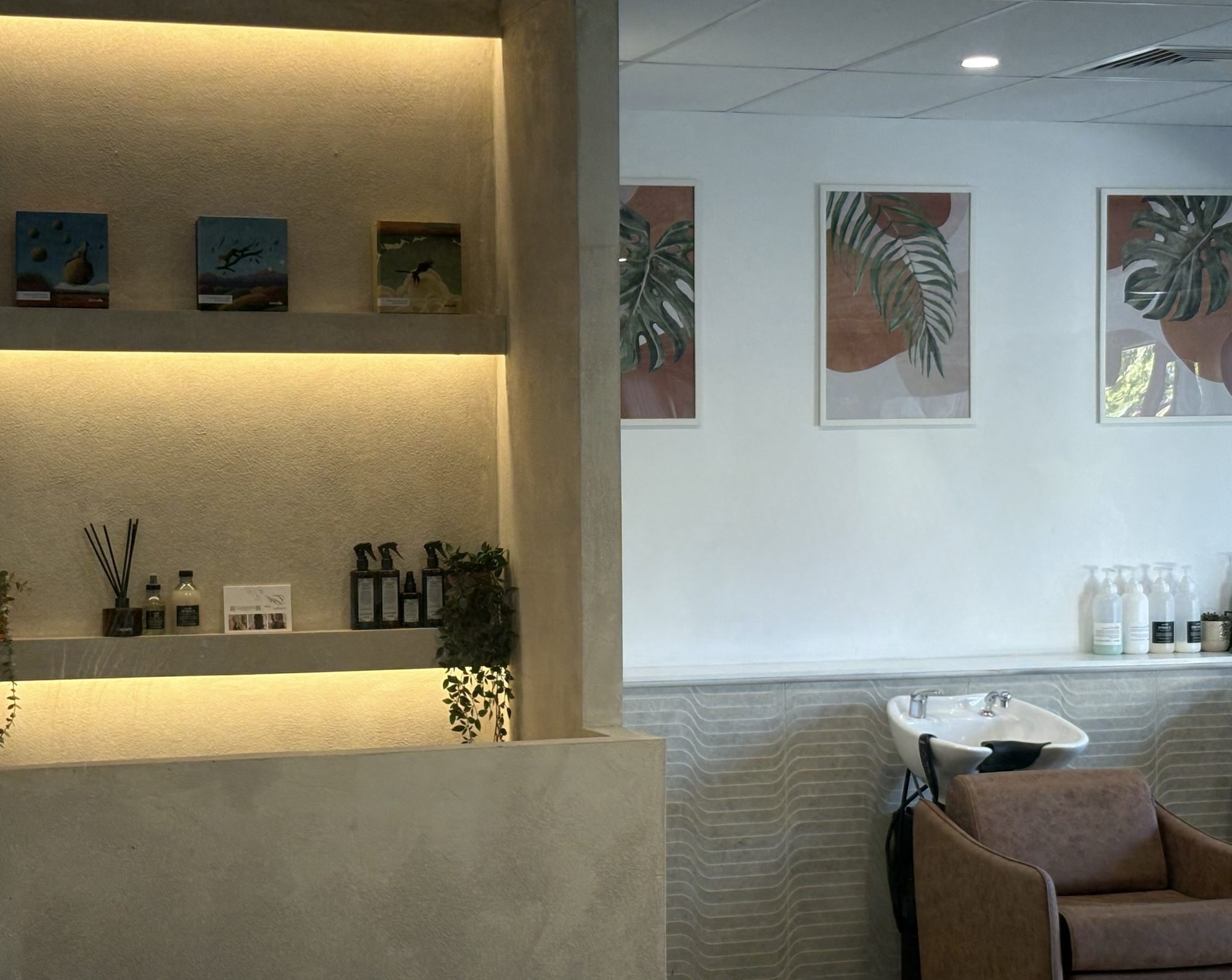 Inside Purabelle in Nerang, washed plaster walls and warm lighting