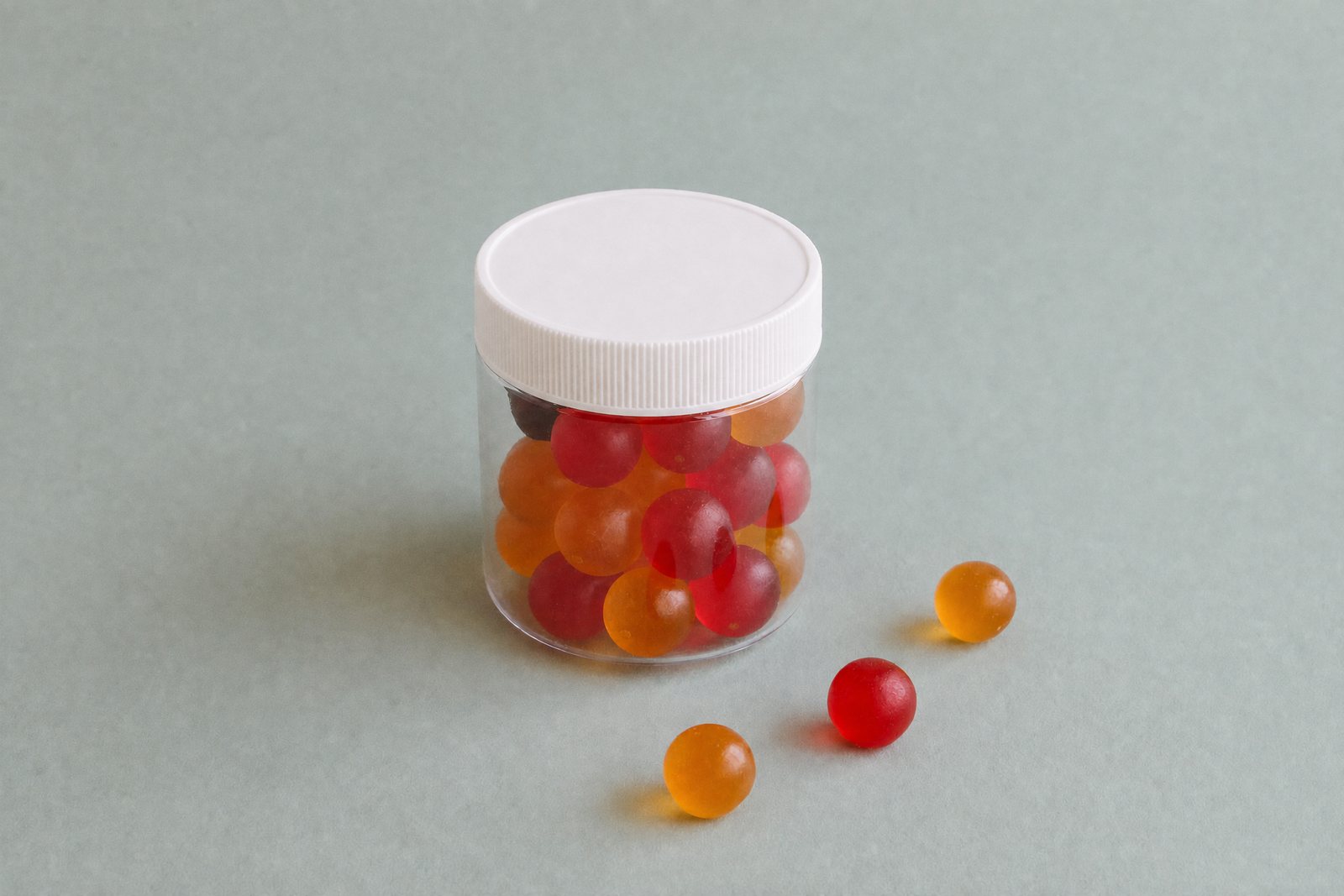 Small pectin gummies in a clear jar