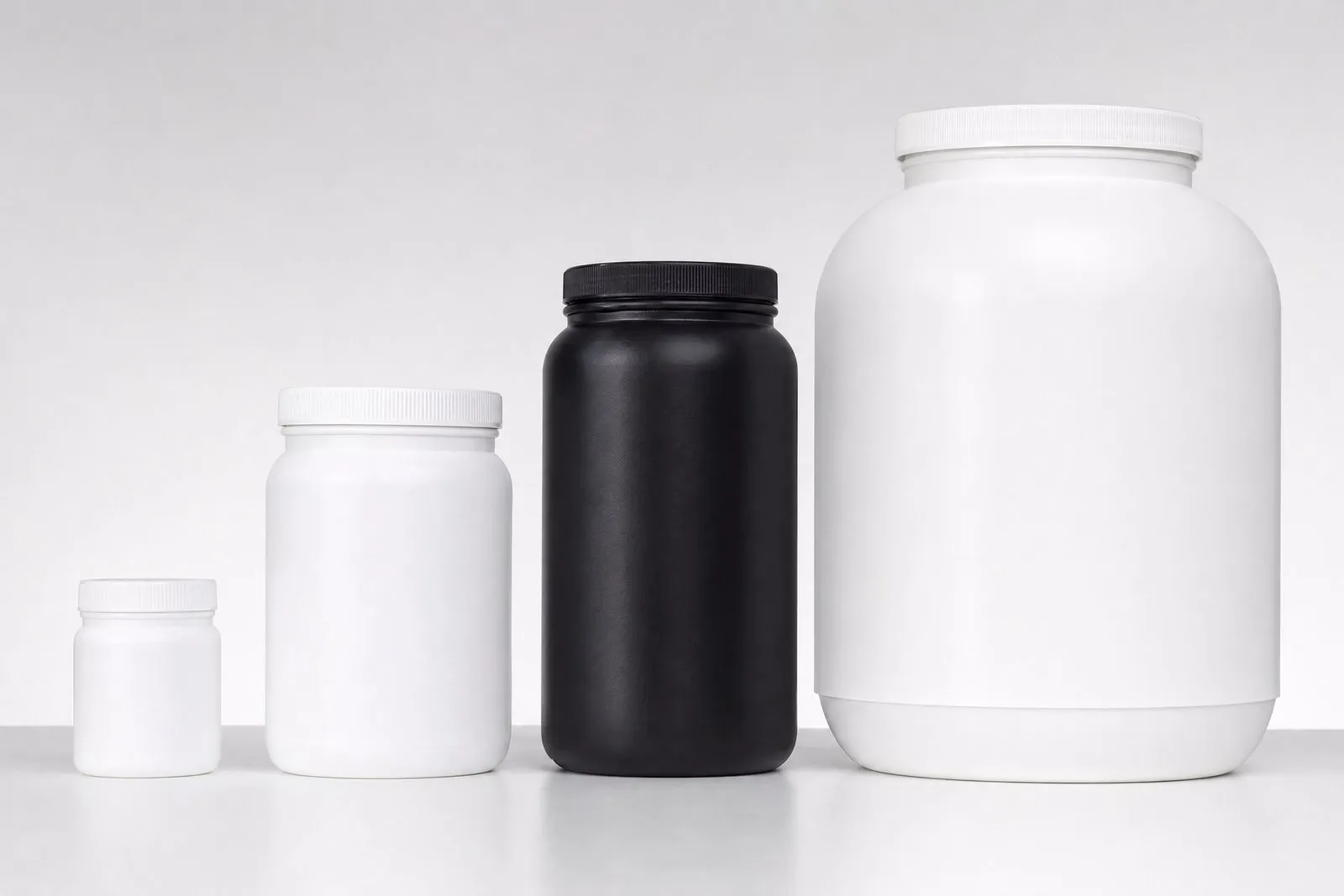 Powder jars from 6 oz to 2 gallons in white, black and clear
