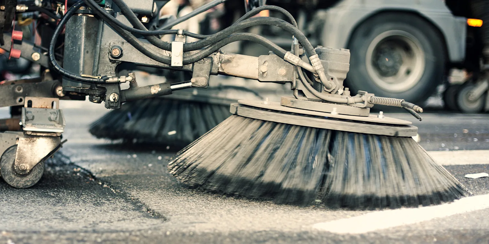Commercial parking lot power sweeping