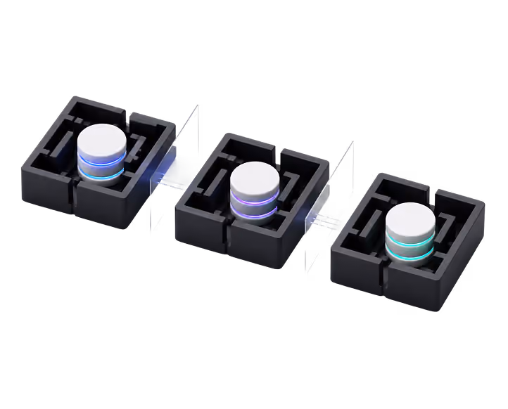 Illustration of three identical storage module icons, each with a glowing disc in purple, purple, and teal