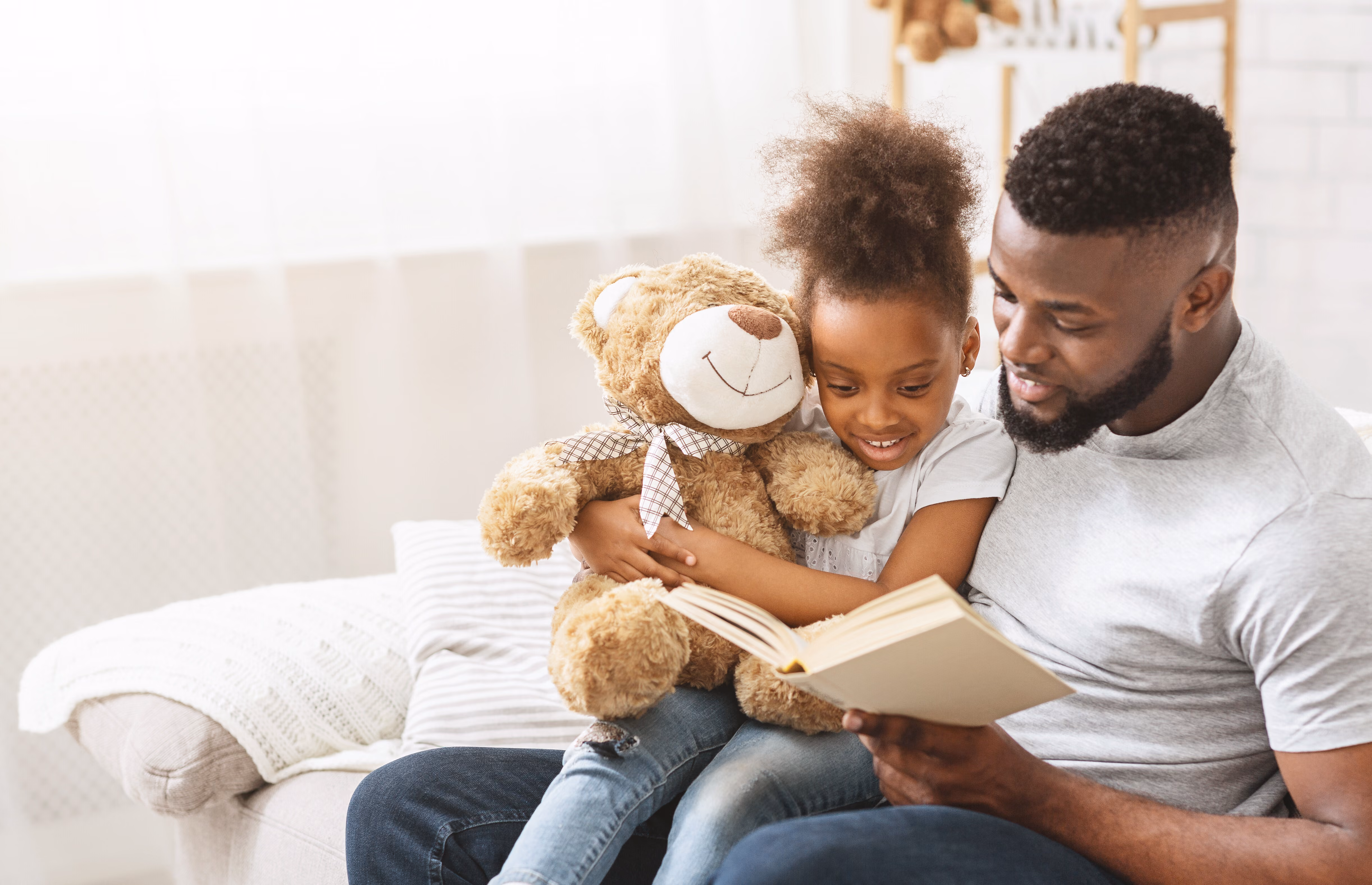 Family smiling out window stock image