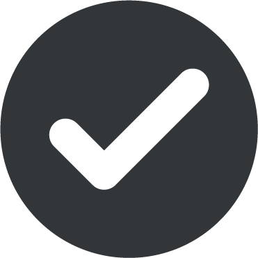 White check mark inside a dark gray circle, symbolizing confirmation or success.