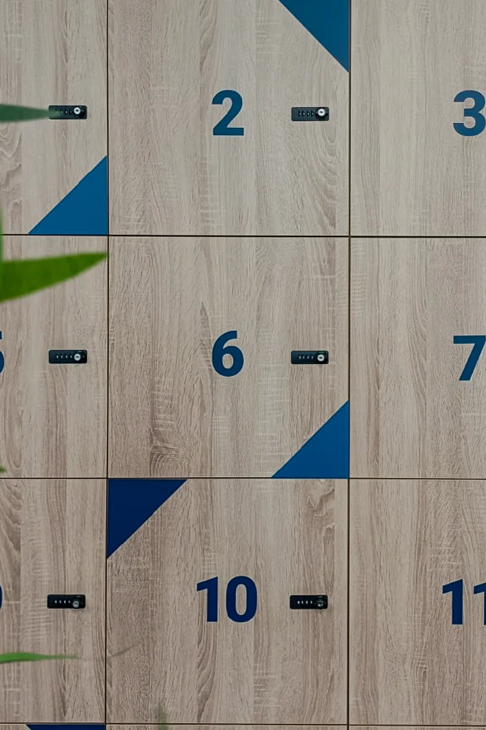 Wood-effect lockers with blue numbers and triangle graphics