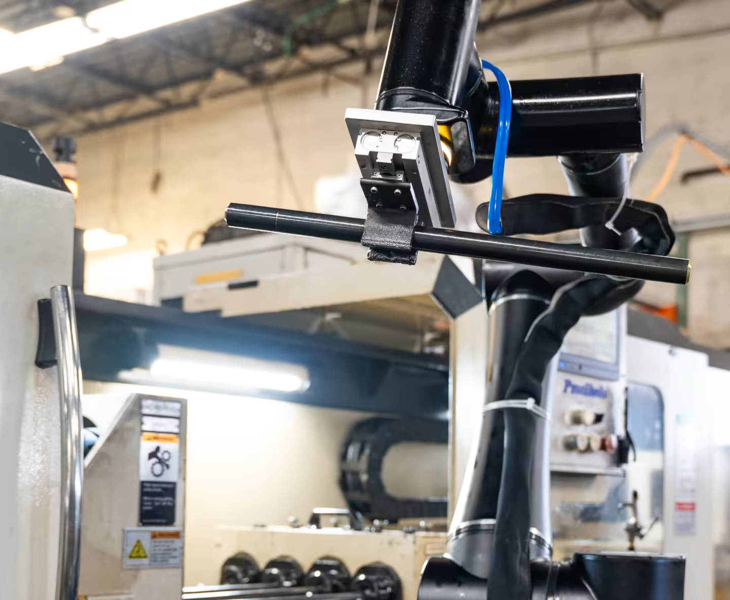 Standard Bots robot arm used for machining