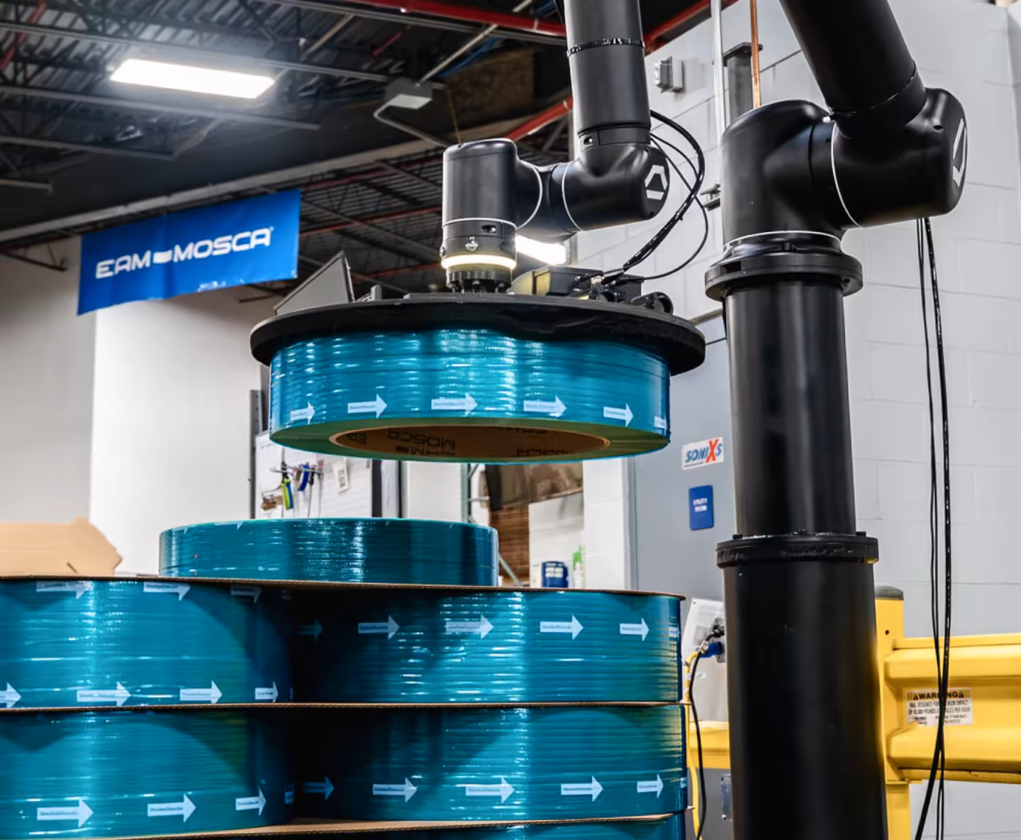 Standard Bots robot arm used for palletizing